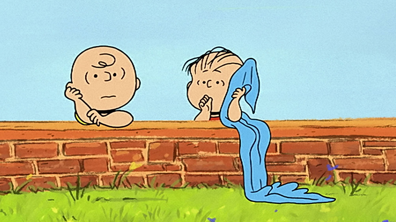 Happiness is a Warm Blanket: Charlie Brown and Linus sitting at a brick wall
